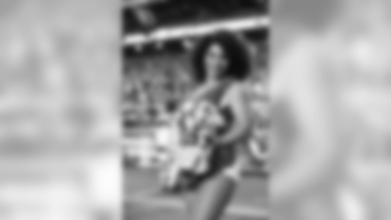 Images of Cardinals cheerleader Tequasia during the 2019 season