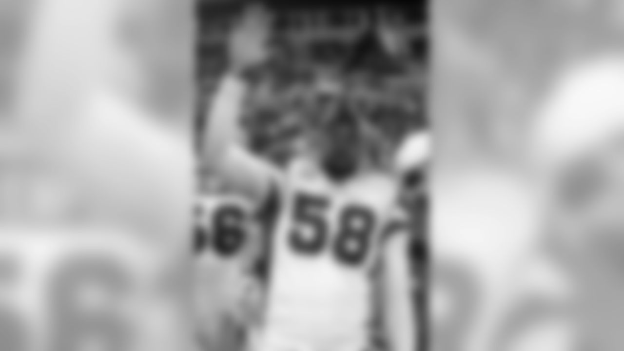 LB Karlos Danbsy waves good night to the Panthers fans.