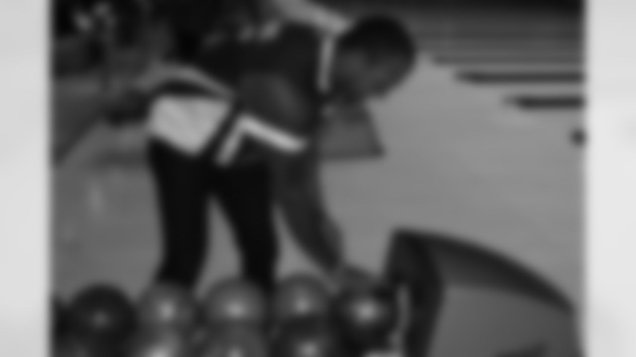 WR Michael Floyd grabs a bowling ball