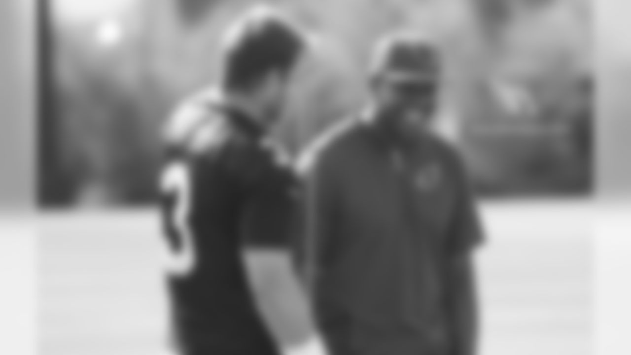 QB Carson Palmer (left) with QB coach Byron Leftwich during minicamp