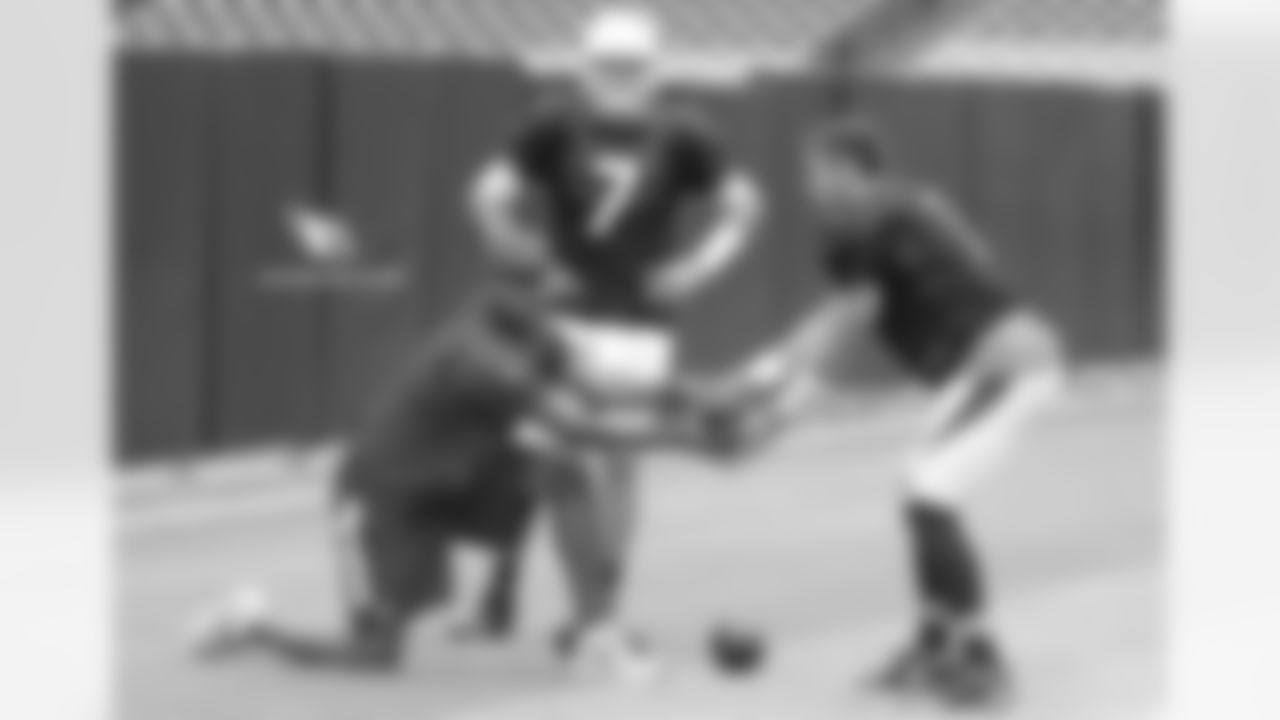 Day 17: QB Trevor Knight (right) runs through drills with coach Byron Leftwich (left)