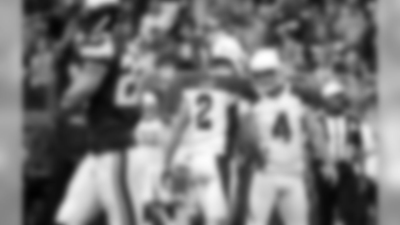 Arizona Cardinals kicker Phil Dawson (4) celebrates with teammate Andy Lee (2) after making a 26-yard field goal during the first half of an NFL football game against the Minnesota Vikings, Sunday, Oct. 14, 2018, in Minneapolis.