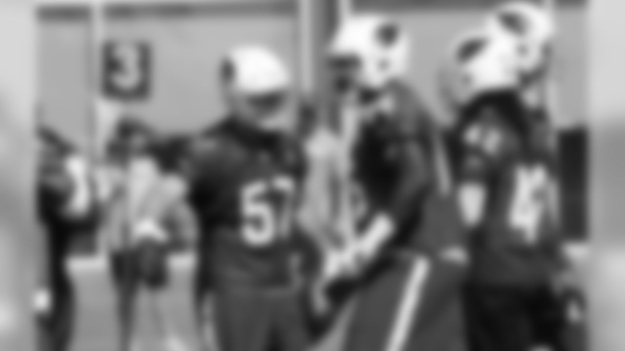 LB Mikey Bart (57) happy after an interception