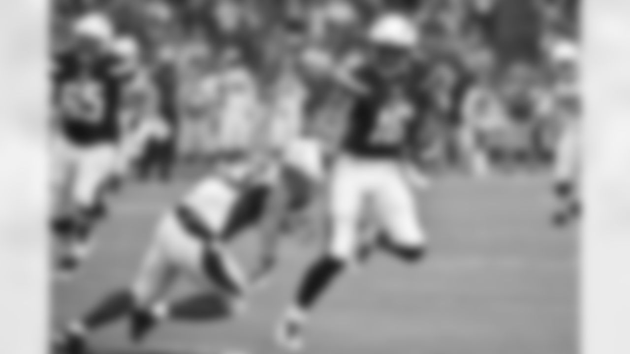 CB Bryan McCann attempts to tackle San Diego WR Seyi Ajirotutu
