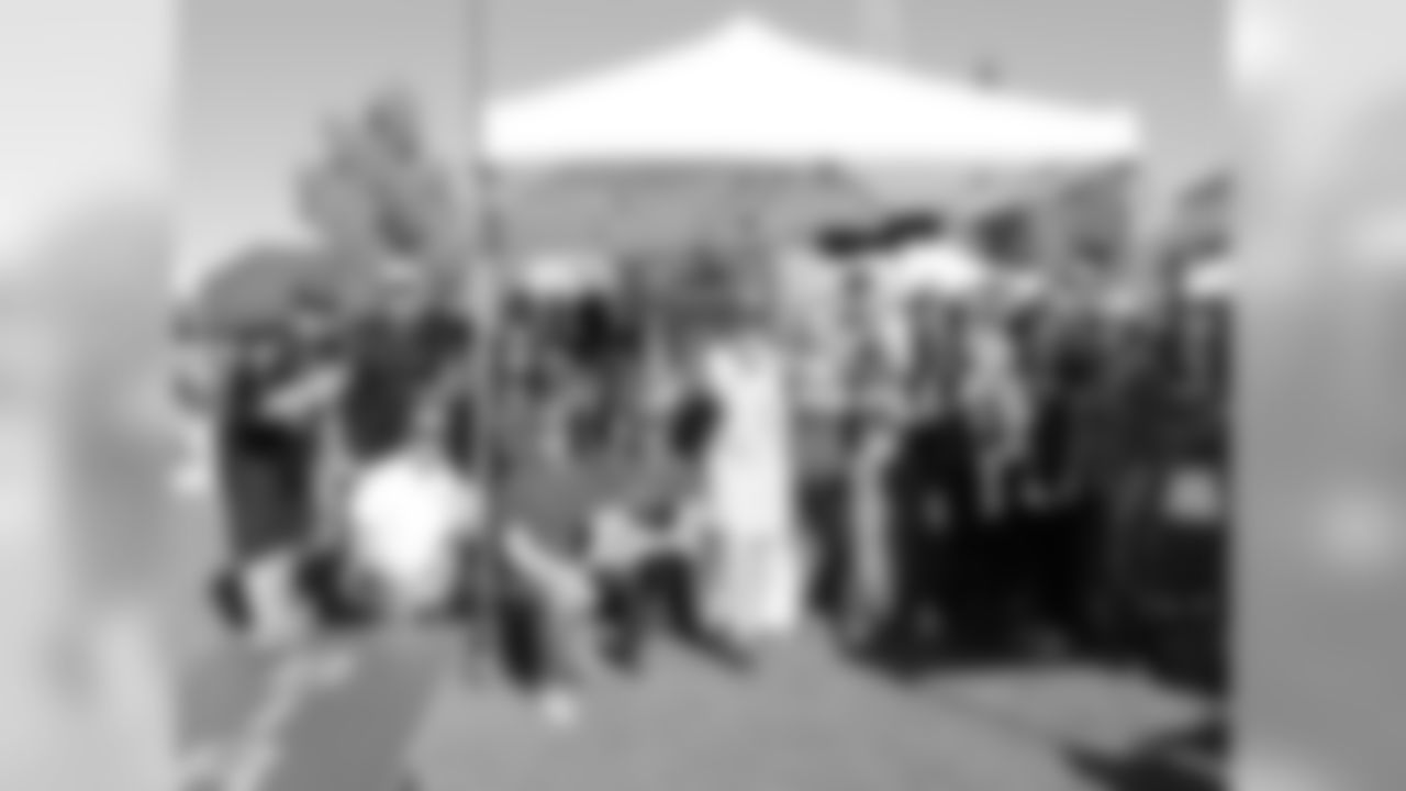 Big group of fans enjoying their tailgate