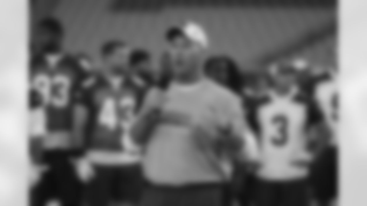 Coach Ken Whisenhunt talks to the fans