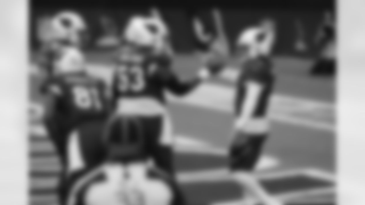 Kyler Murray celebrates a touchdown run with his center Lamont Gaillard
