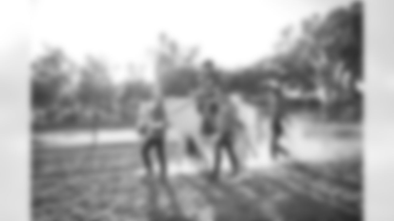 The Arizona Cardinals visit Hunkapi Farms to work with therapy horses and families with ALS on Saturday, May 13, 2023 in Scottsdale, AZ.