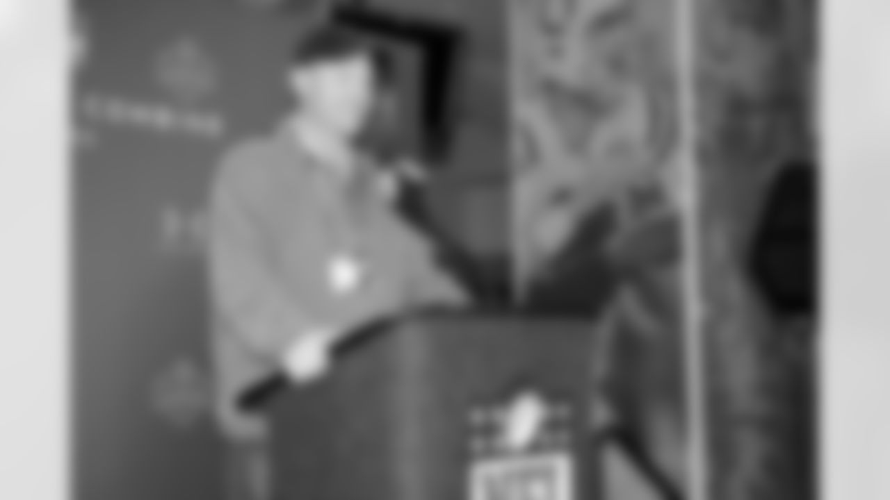 Cardinals coach Ken Whisenhunt smiles at a question