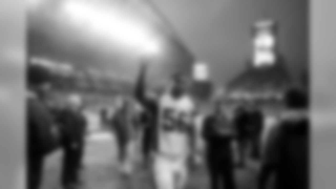 2013: LB Karlos Dansby walks off the field after the upset of the Seahawks.