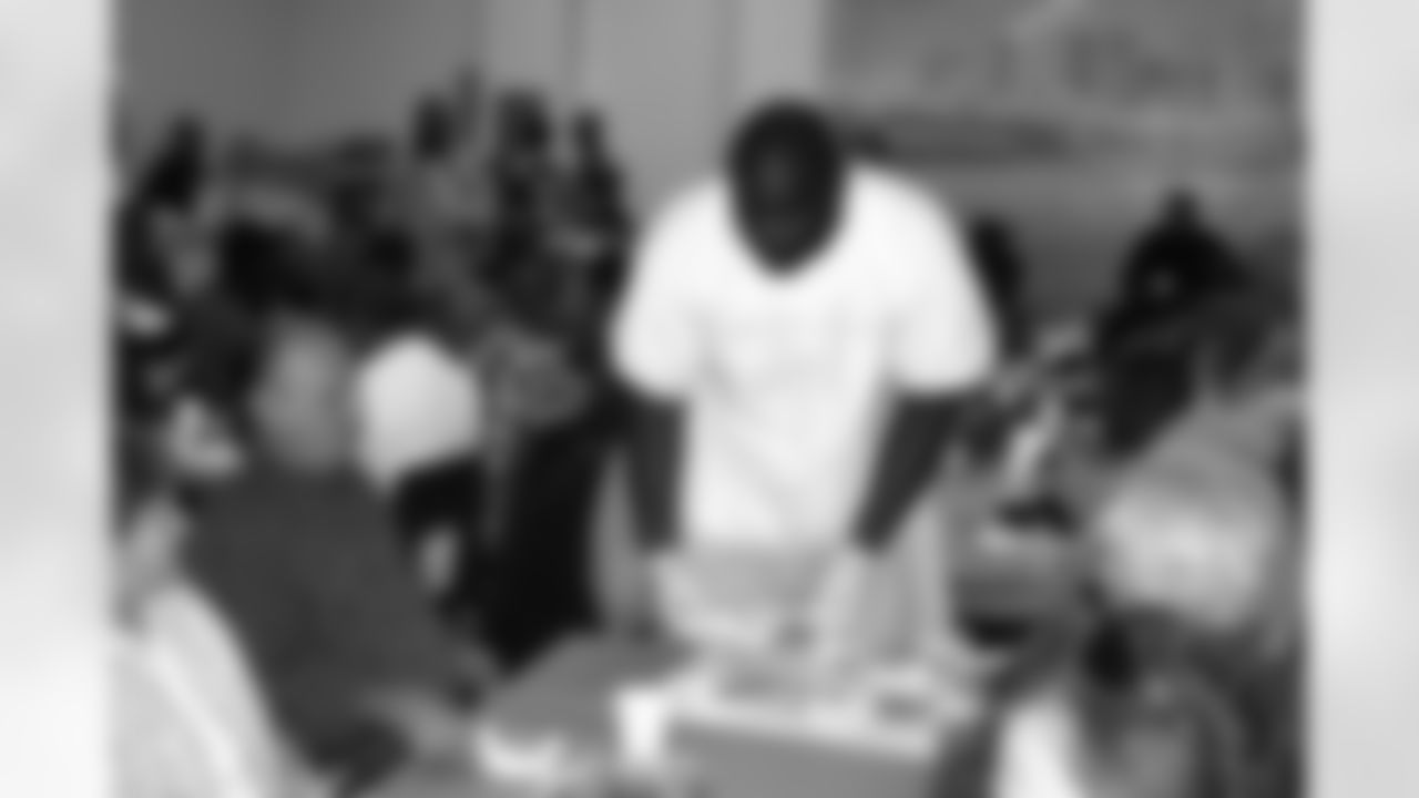 Levi Brown serves up some food