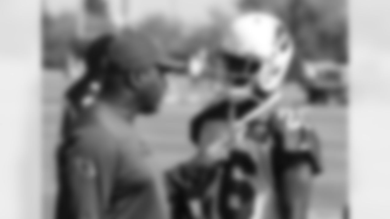 Cornerbacks coach Kevin Ross teaches CB Brandon Williams