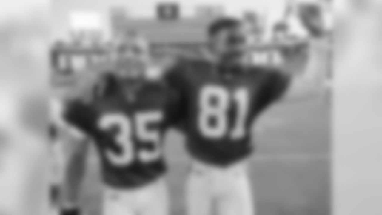 1999: Cardinals CB Aeneas Williams (left) and WR Frank Sanders celebrate a win over the Lions