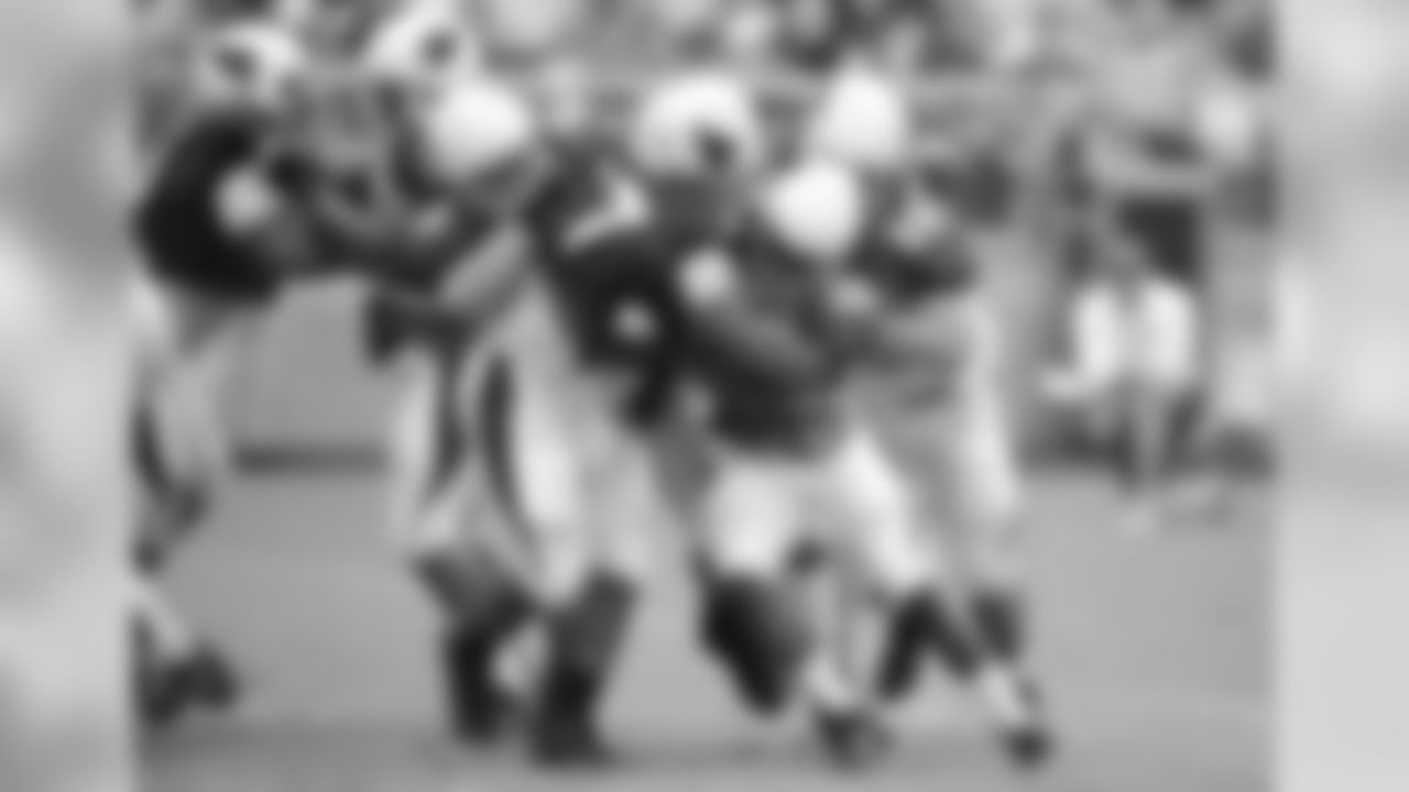 RB Andre Ellington tries to break the tackles