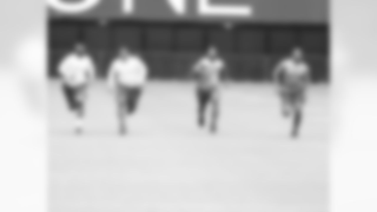 The defensive linemen during the run test