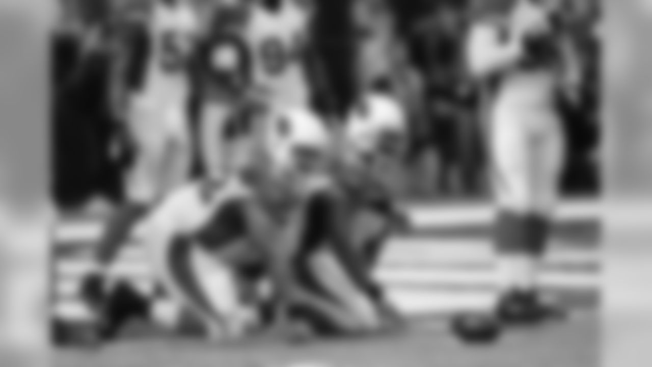 DT Darnell Dockett and DT Dan Williams wait at the goal-line during the season opener in St. Louis.