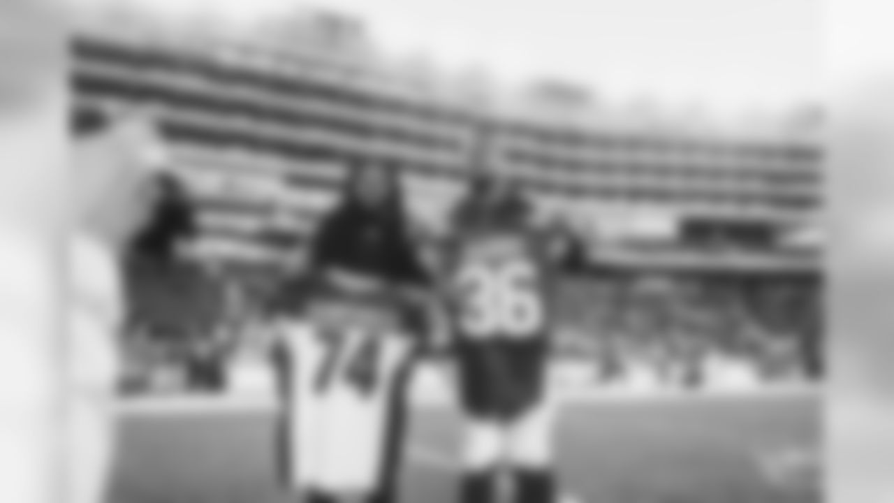 LT D.J. Humpries with 49ers S Marcell Harris