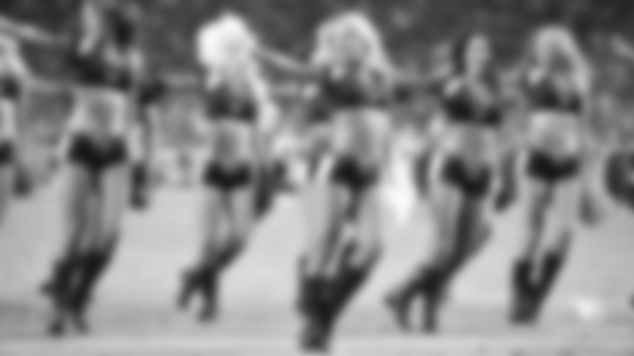 Images of Cardinals cheerleader Davis from the 2018 season