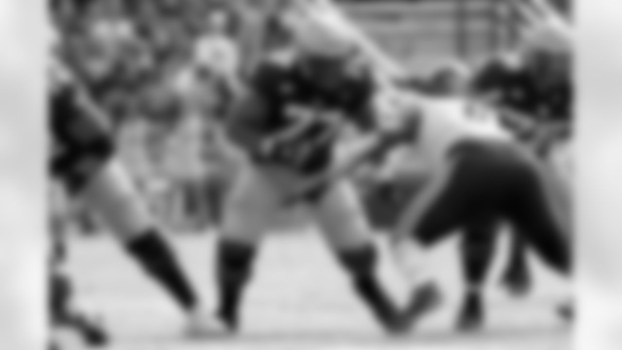 Boston College offensive lineman Zion Johnson (77) prepares to block during the second half of an NCAA college football game against Missouri, Saturday, Sept. 25, 2021, in Boston. (AP Photo/Mary Schwalm)