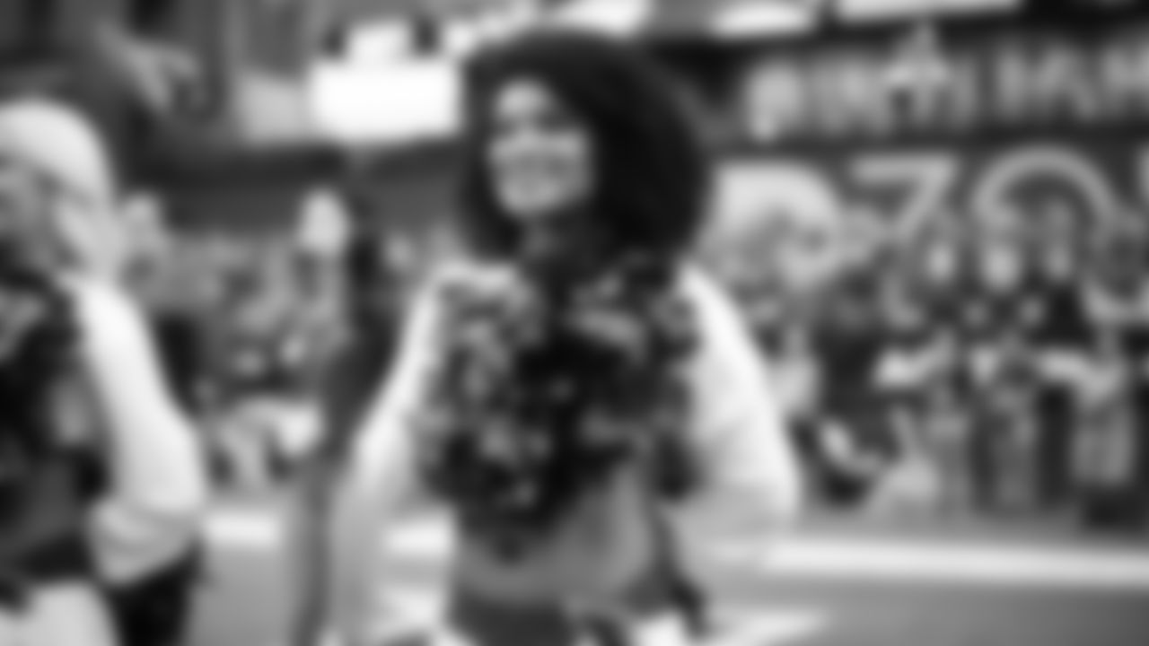 Images of Cardinals cheerleader Tequasia during the 2019 season