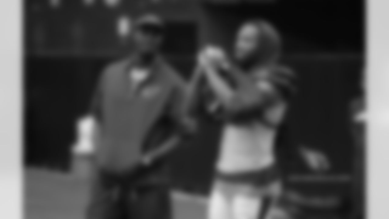 Day 12: Plaxico Burress (left) with WR Larry Fitzgerald (right)