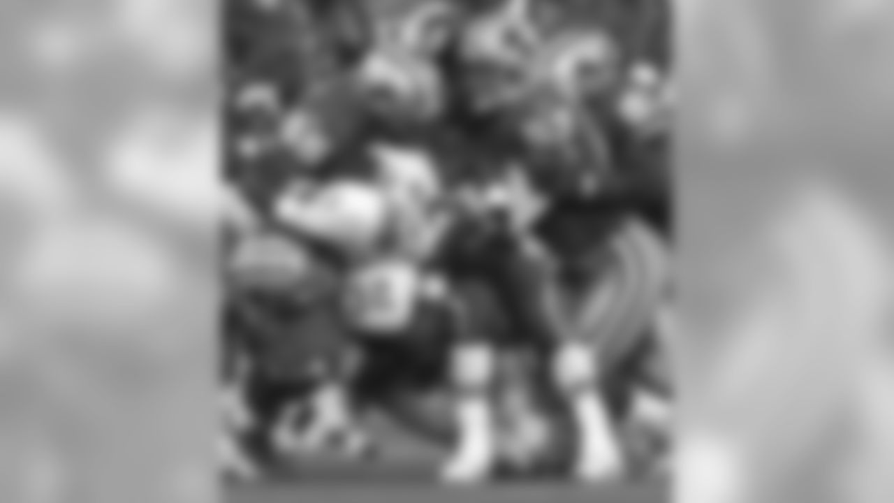 1998: Cardinals RB Michael Pittman fights for yardage