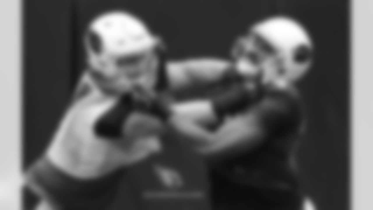 Day 12: DT Josh Mauro (left) battles with TE Jermaine Gresham (right)