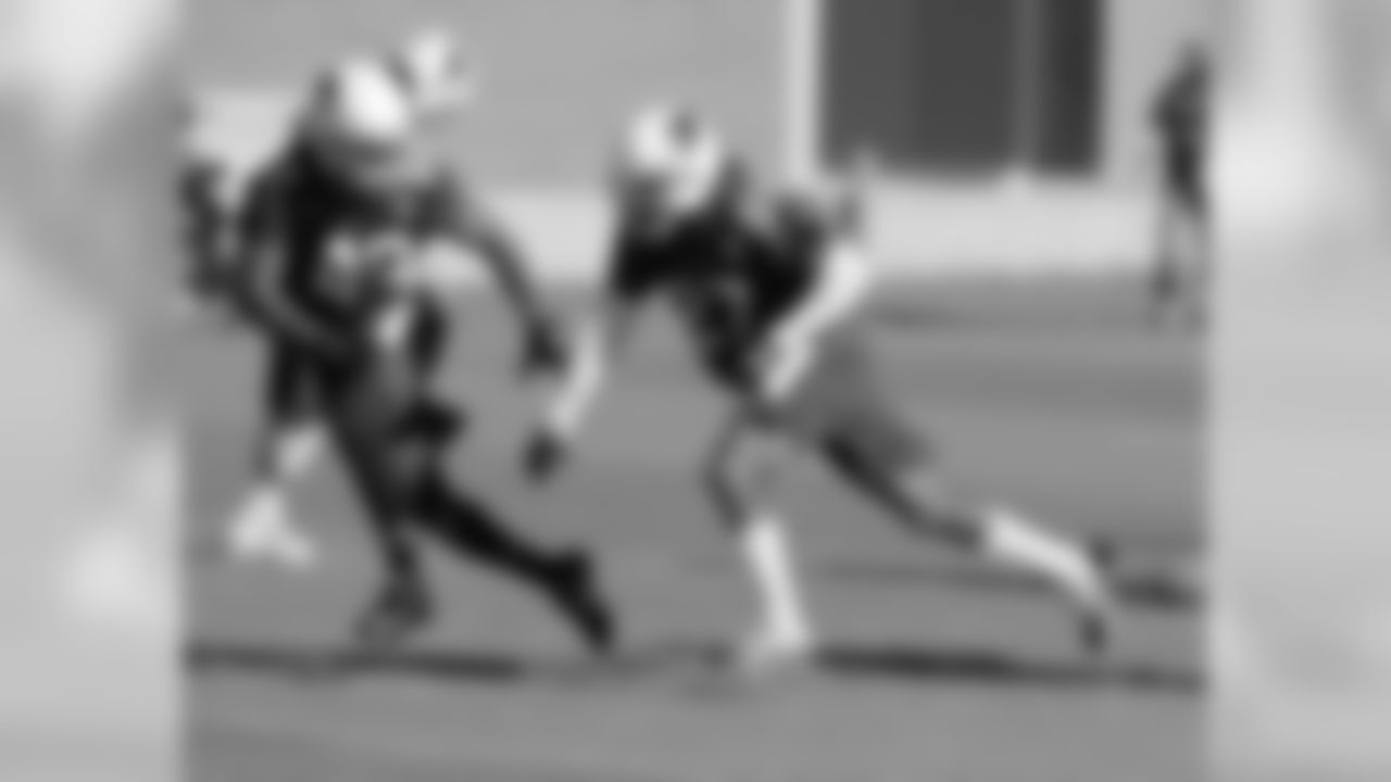 CB Darren Woodard (27) and S D.J. Campbell