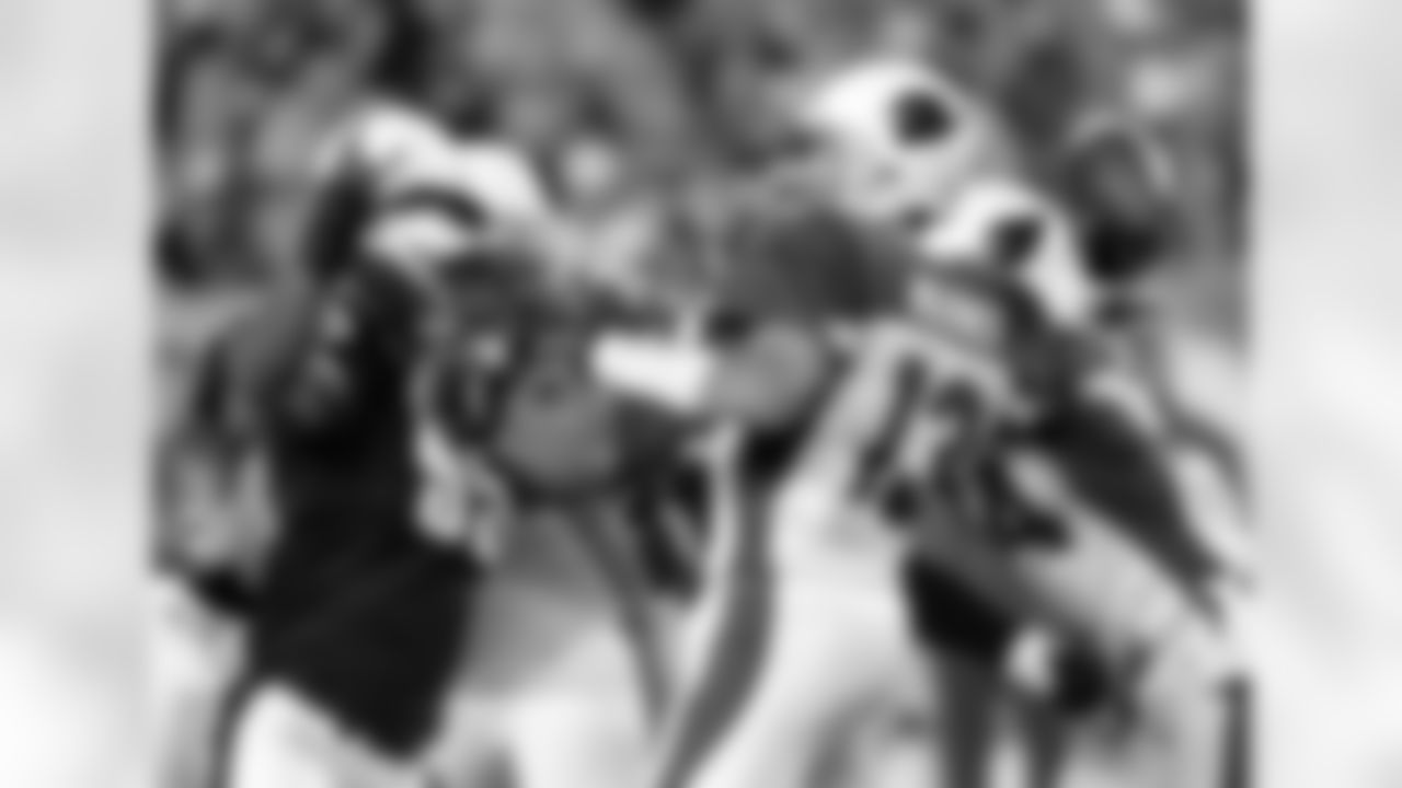 2008: QB Kurt Warner winds up to throw a pass