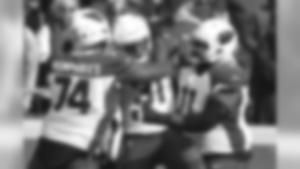 Arizona Cardinals running back David Johnson (31) celebrates a touchdown with teammates offensive tackles D.J. Humphries (74) and Andre Smith (71) during the first half of an NFL football game against the Kansas City Chiefs in Kansas City, Mo., Sunday, Nov. 11, 2018.