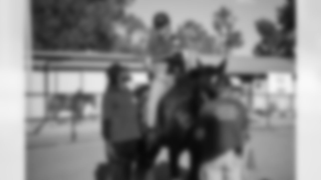 The Arizona Cardinals visit Hunkapi Farms to work with therapy horses and families with ALS on Saturday, May 13, 2023 in Scottsdale, AZ.