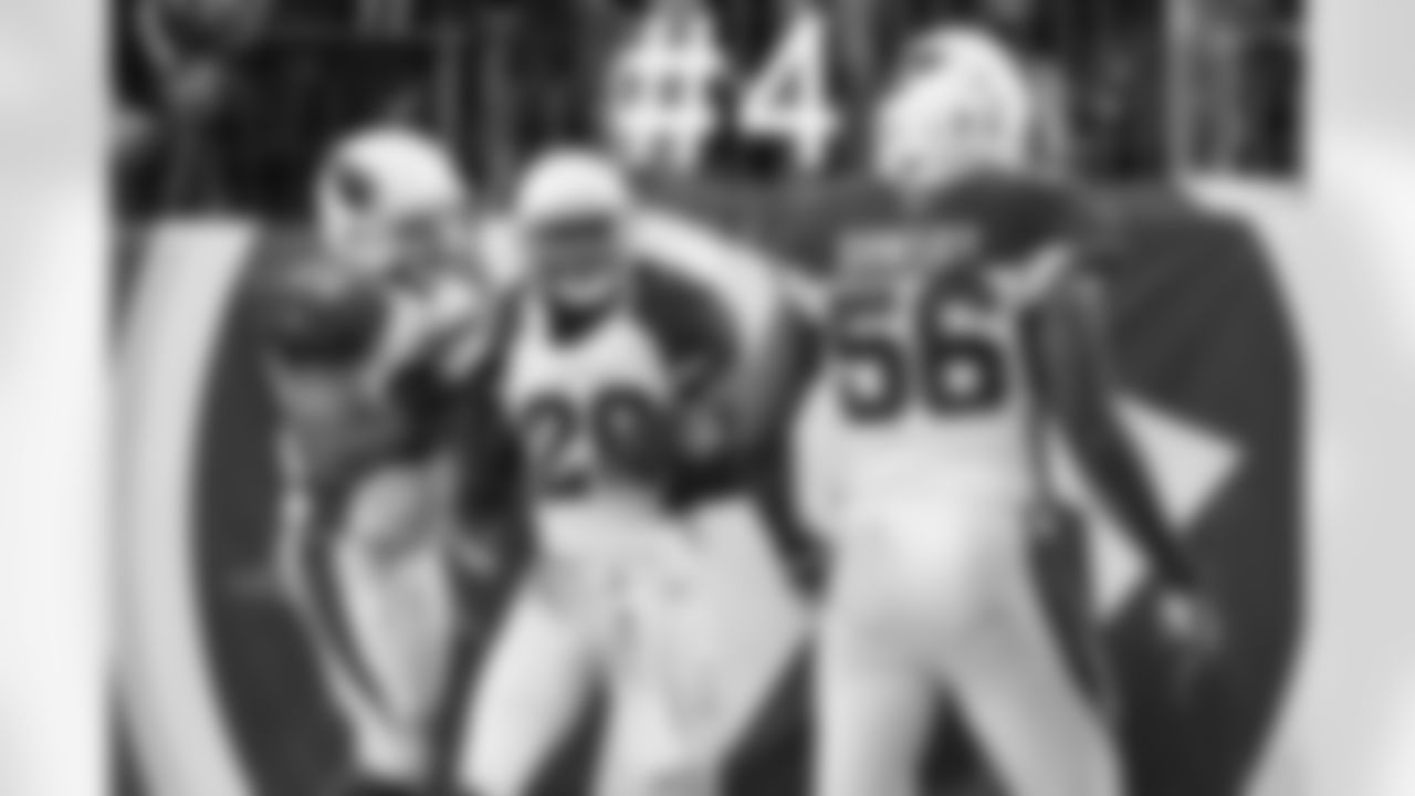 CB Antoine Cason celebrates his interception return for a touchdown.