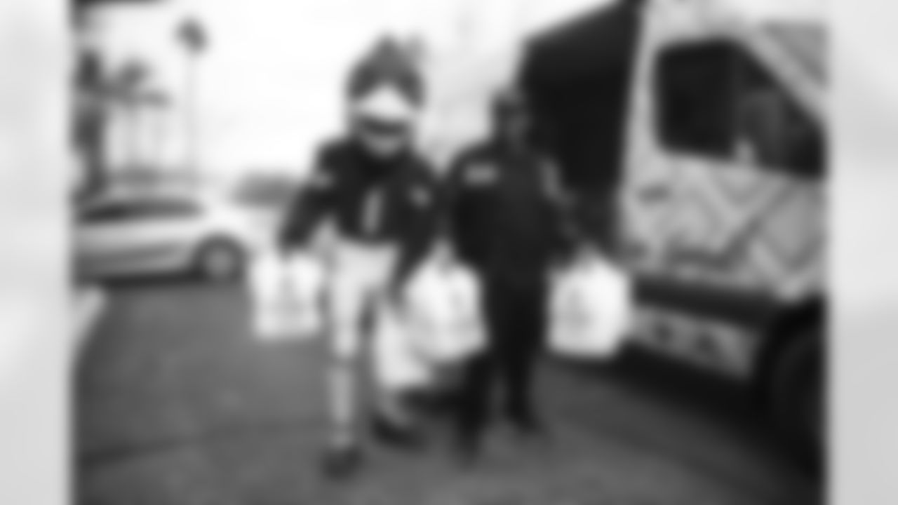 The Arizona Cardinals provide meals from Lo-Lo's Chicken & Waffles to the Arizona Informant as part of a Black History Month Community Spotlight on Tuesday, Feb. 14, 2023 in Phoenix, AZ.
