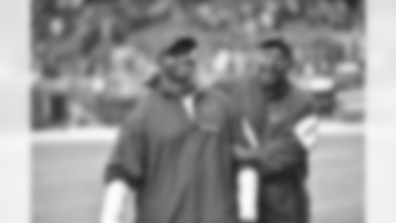 Defensive coordinator Todd Bowles (left) and wide receivers coach Darryl Drake after the win over the 49ers