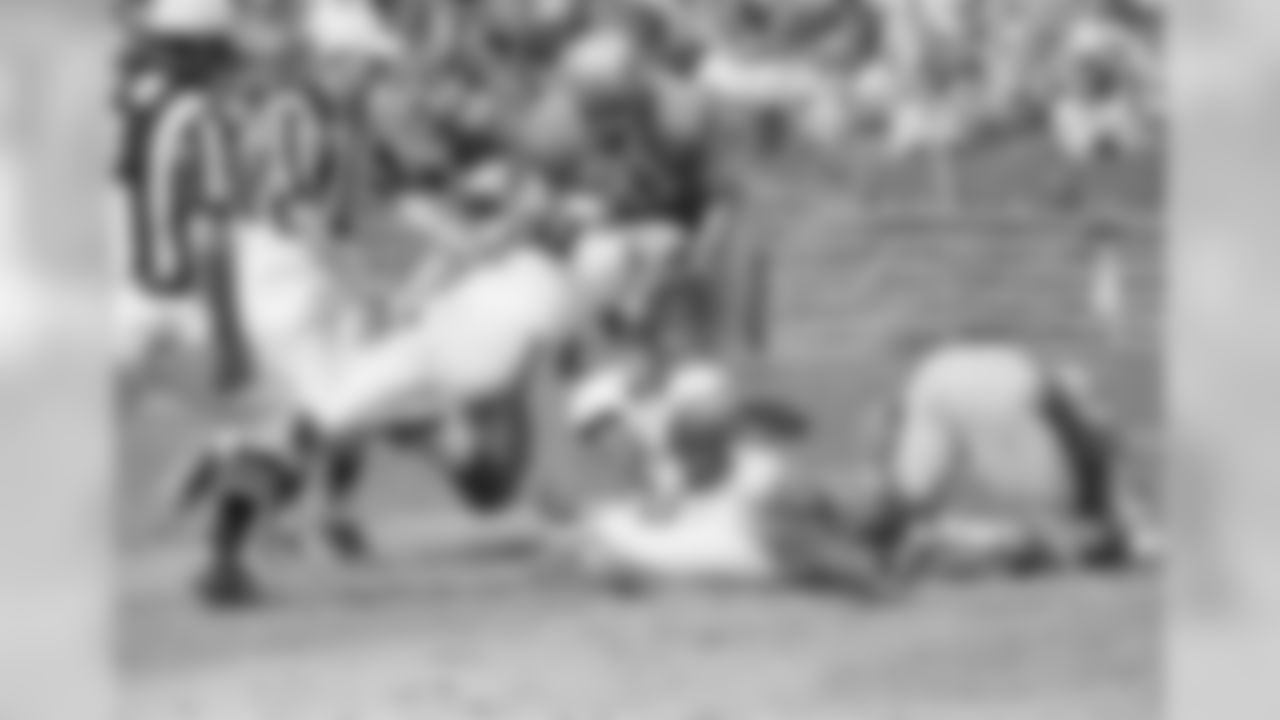 A Jim Hart pass to Johnny Holand (23) was good for 35 yards in the first quarter Sunday, Oct. 1, 1967 in a game between the Cardinals and Detroit. The Cardinals' Jackie Smith throws a block at Bruce Maher of the Lions. St. Louis won 38-28.