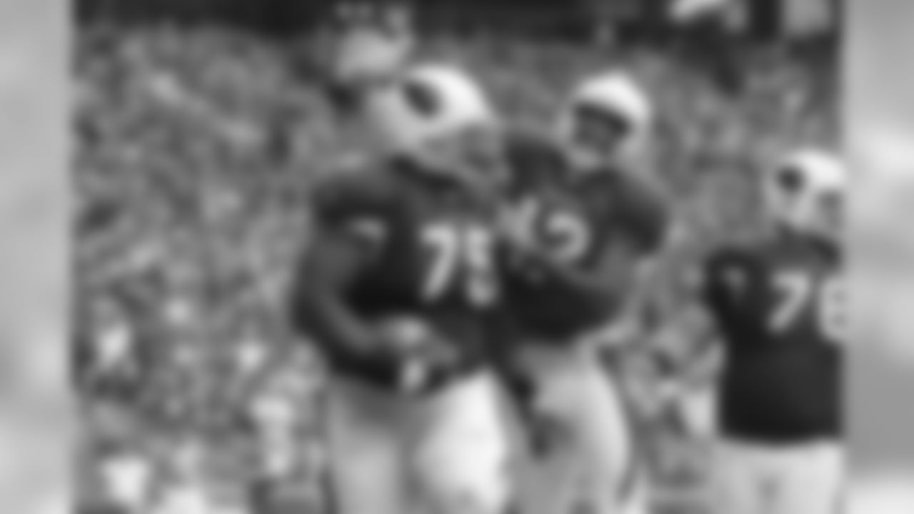 Levi Brown and Andre Roberts celebrate a TD in 2010
