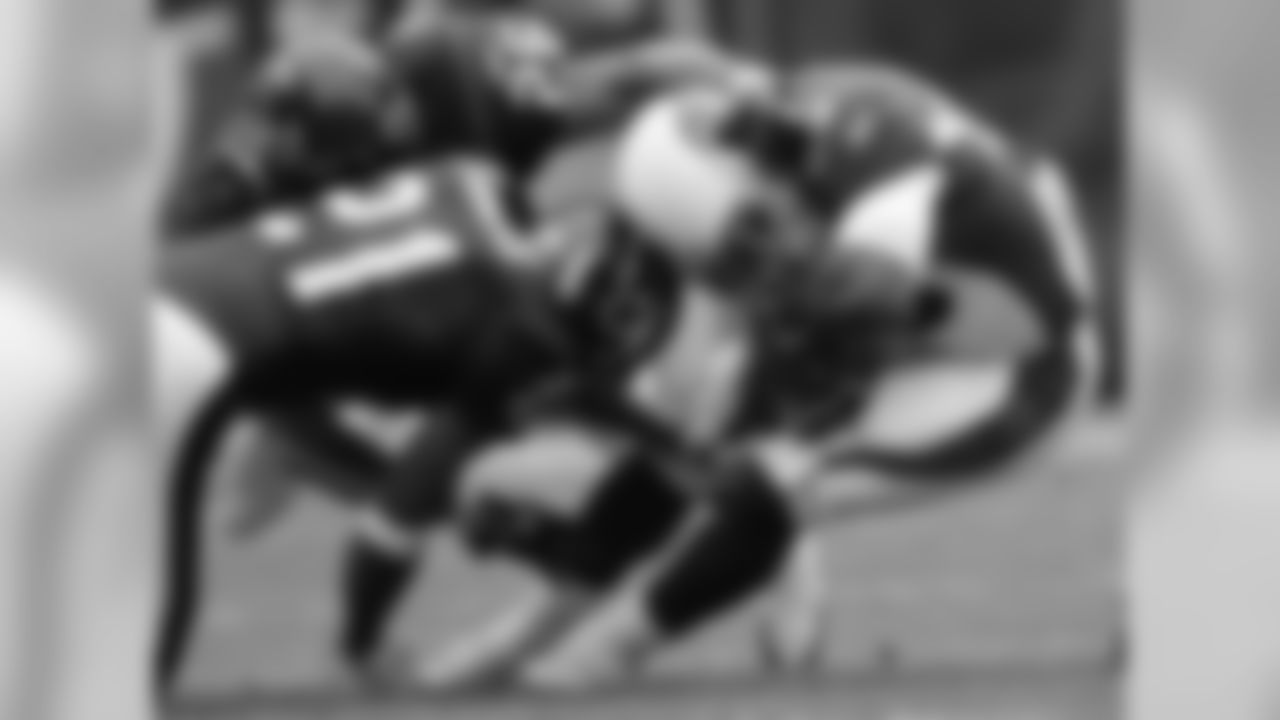 2005: RB J.J. Arrington fights for yardage