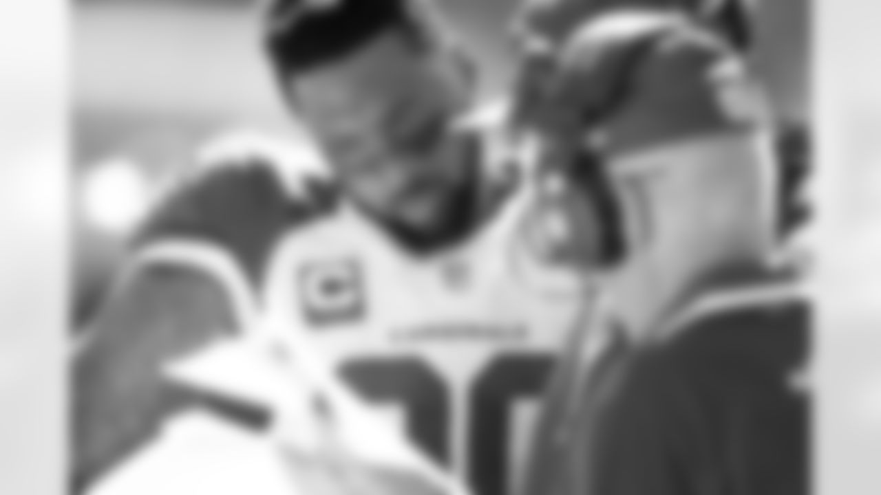 DT Darnell Dockett studies strategy during the 49ers game in San Francisco.
