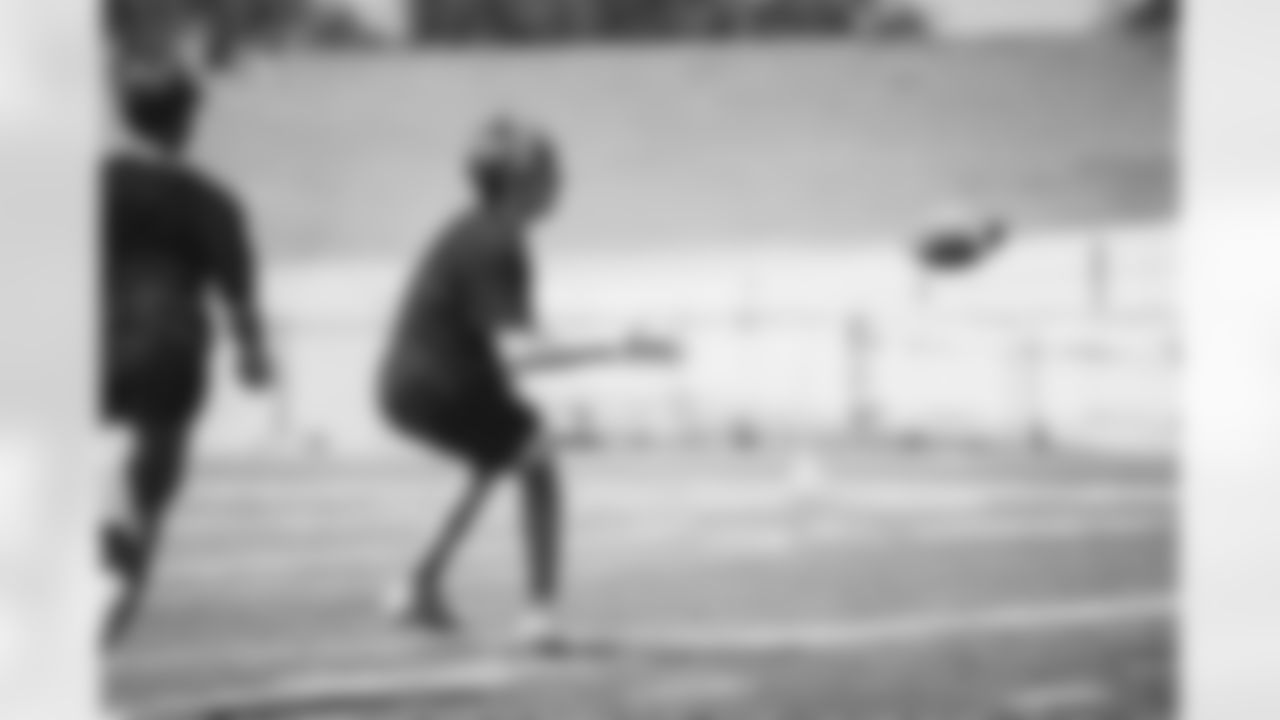 A camper prepares to catch a pass during the camp.
