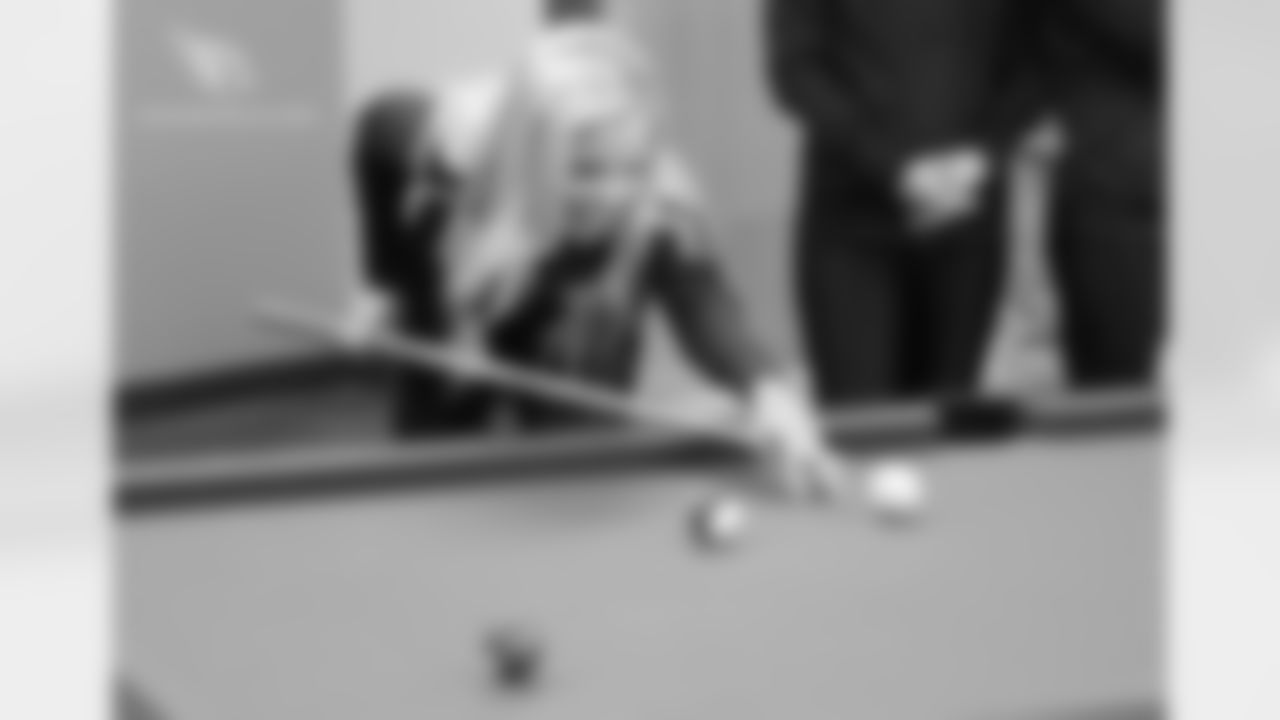 Playing pool in the community center