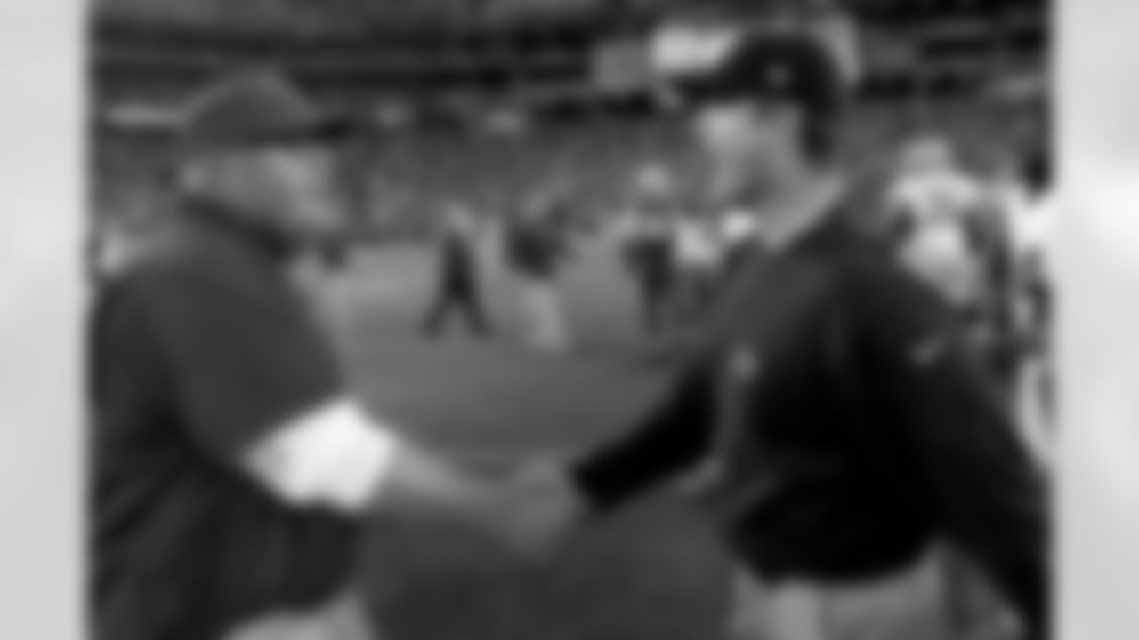 A handshake for 49ers coach Jim Harbaugh after the last game