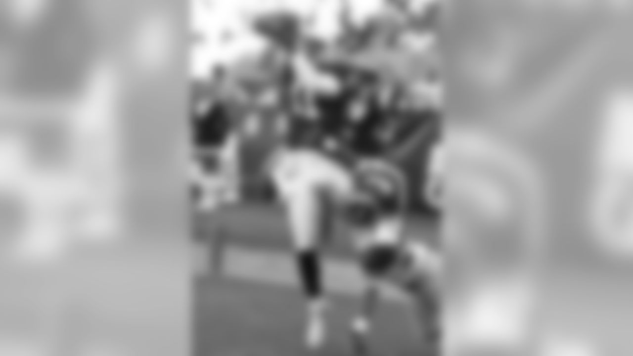 2004: WR Larry Fitzgerald hauls in a touchdown
