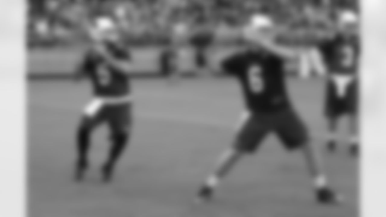 QBs Drew Stanton (5) and Caleb TerBush (6) throw passes