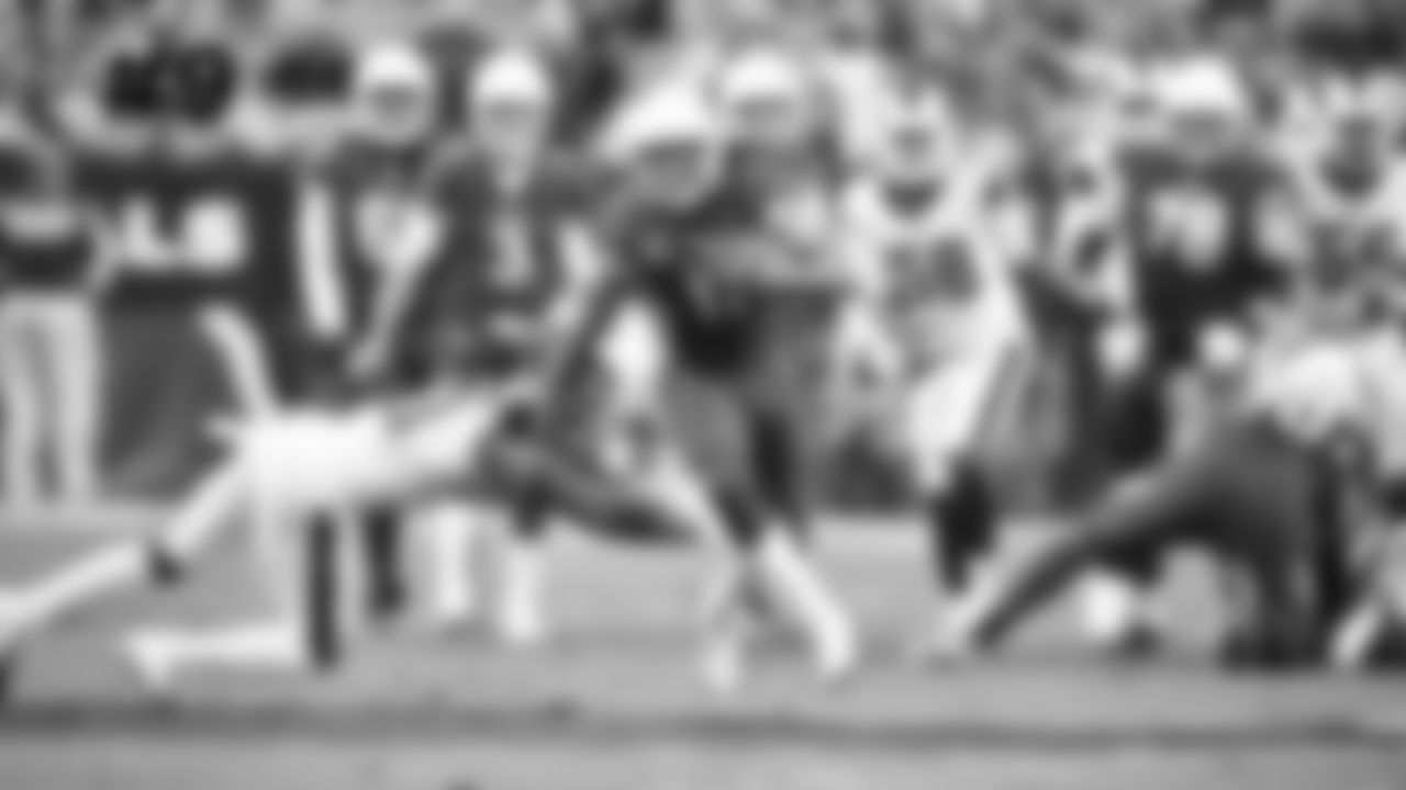 9. WR Larry Fitzgerald shakes off a would-be tackler