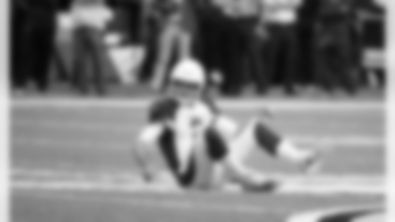 Arizona Cardinals quarterback Josh Rosen sits on the field after throwing a pass during the second half of an NFL football game against the Minnesota Vikings, Sunday, Oct. 14, 2018, in Minneapolis. (AP Photo/Bruce Kluckhohn)