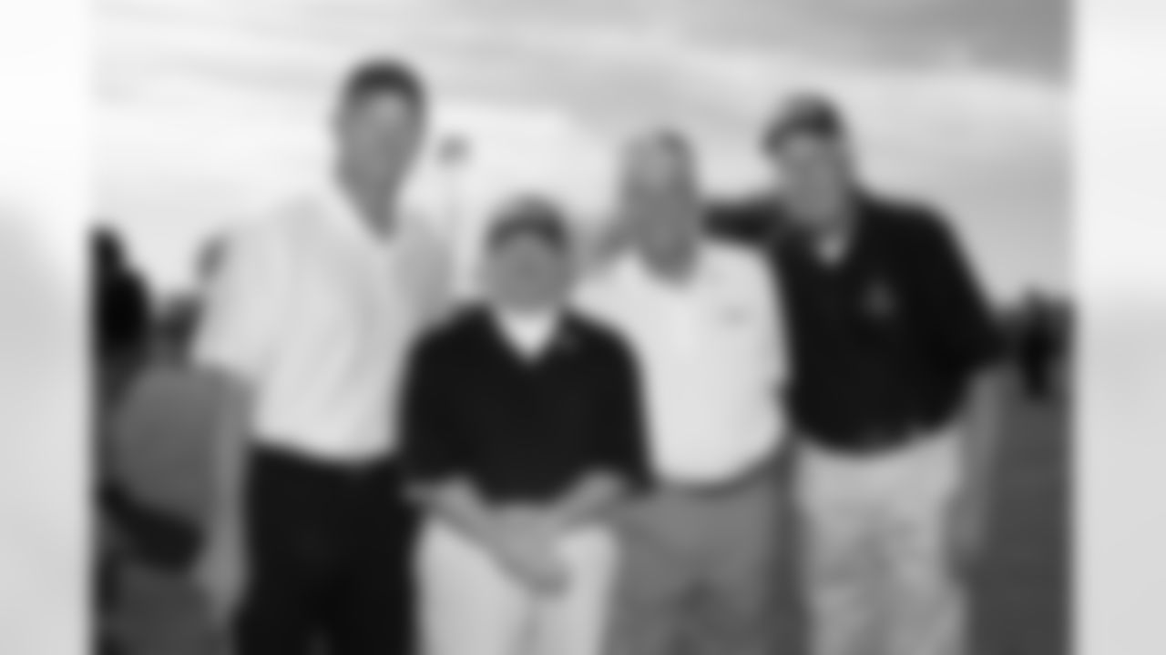 Coach's team and the Special Olympian's father