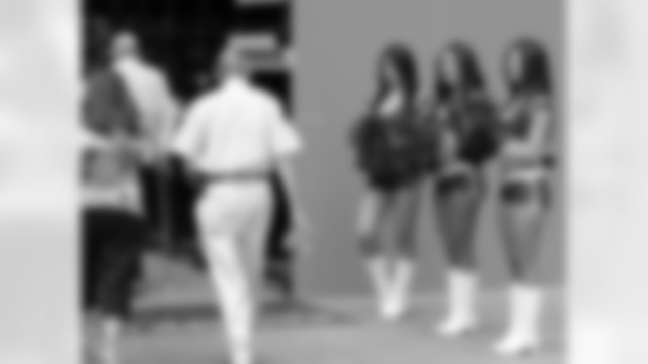 Cheerleaders wishing fans a fond farewell