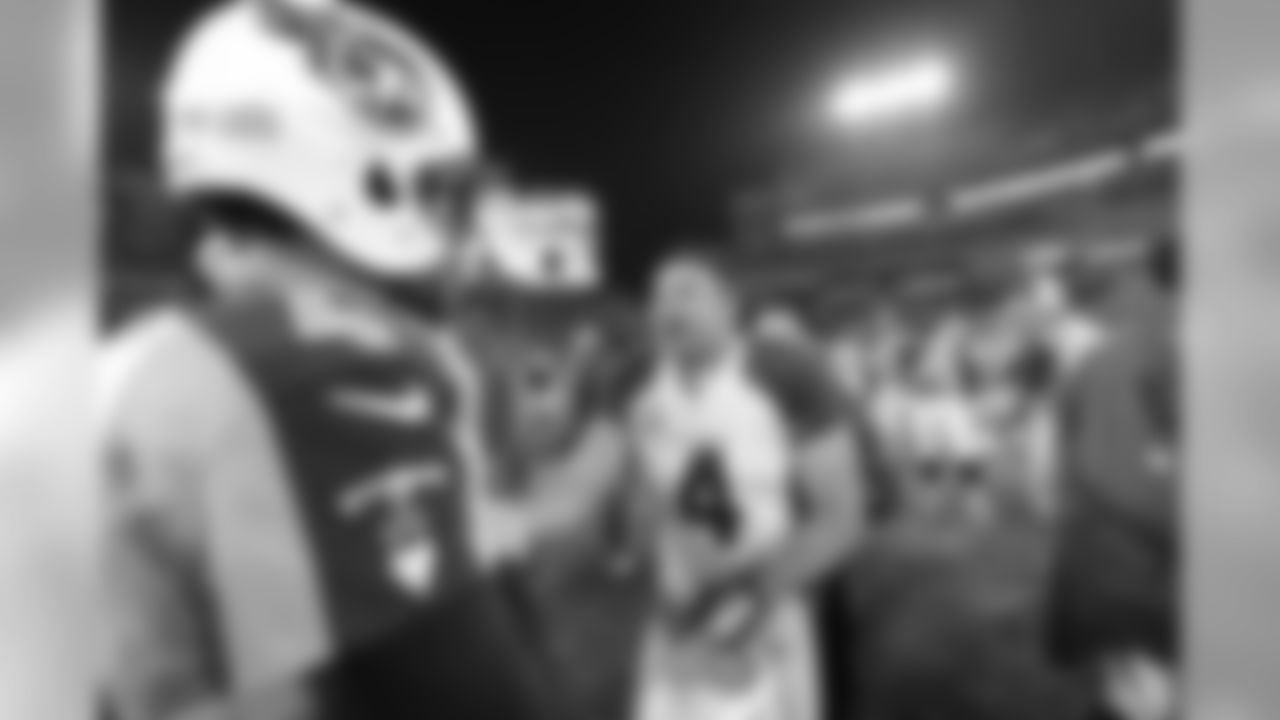 K Jay Feely and Titans QB Ryan Fitzpatrick