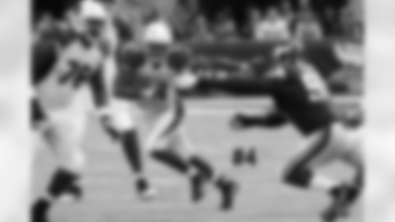 RB David Johnson stiff arms on a run