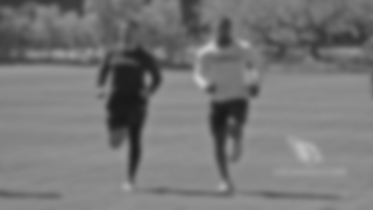 Running backs D.J. Foster and David Johnson.